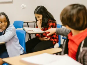Kids in a classroom working on homework.